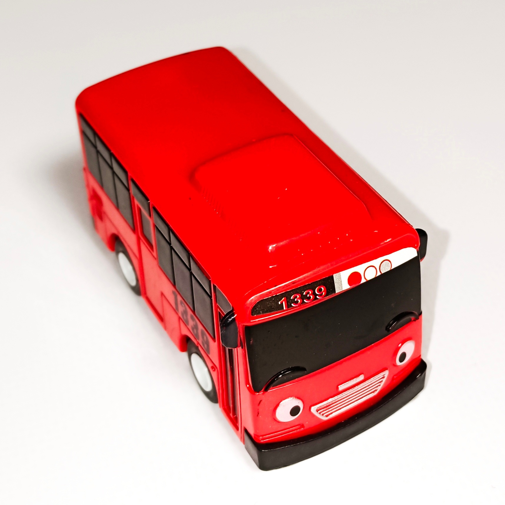 Автобус 1000toys из мультика Тайо красного цвета инерционный