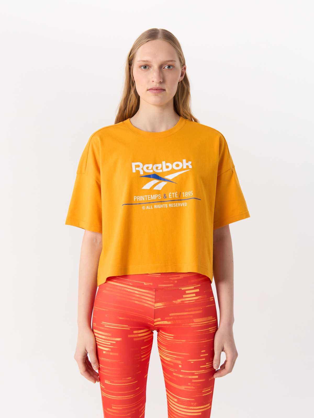 

Футболка женская Reebok EK1276 оранжевая XS, Оранжевый, EK1276