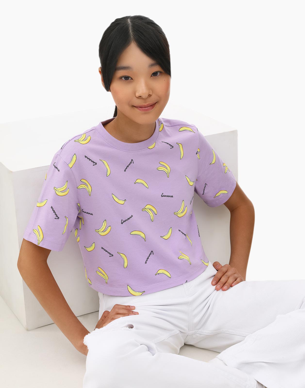 Сиреневая укороченная футболка с бананами для девочки 10-12л/146-152