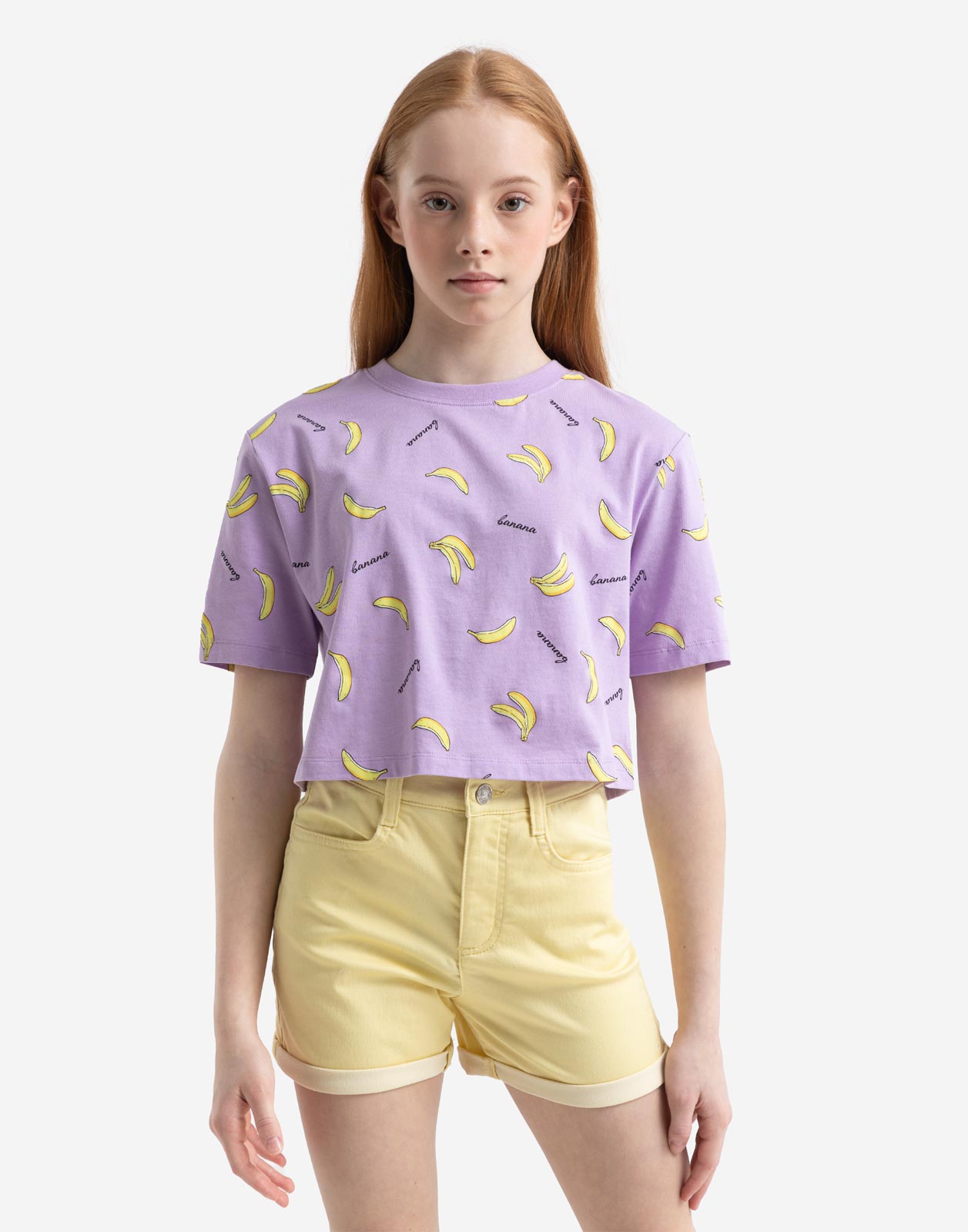 Сиреневая укороченная футболка с бананами для девочки 6-8л/122-128