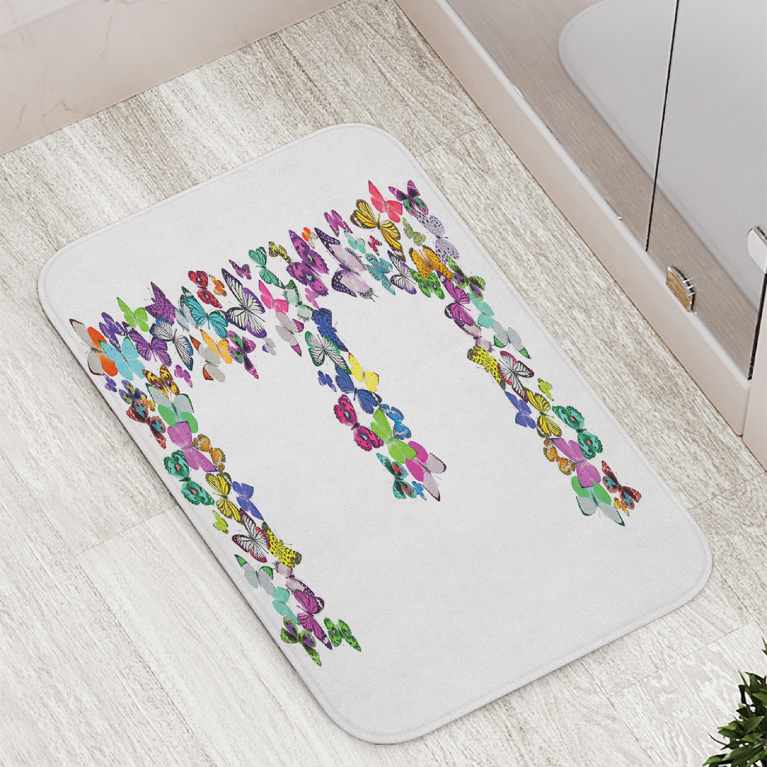 

Коврик противоскользящий JoyArty "Порхающая буква E" для ванной, сауны, бассейна, 77х52 см, Порхающая буква E