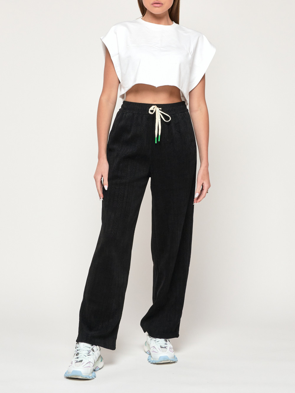 

Спортивные брюки женские NoBrand AD109 черные 52 RU, Черный, AD109