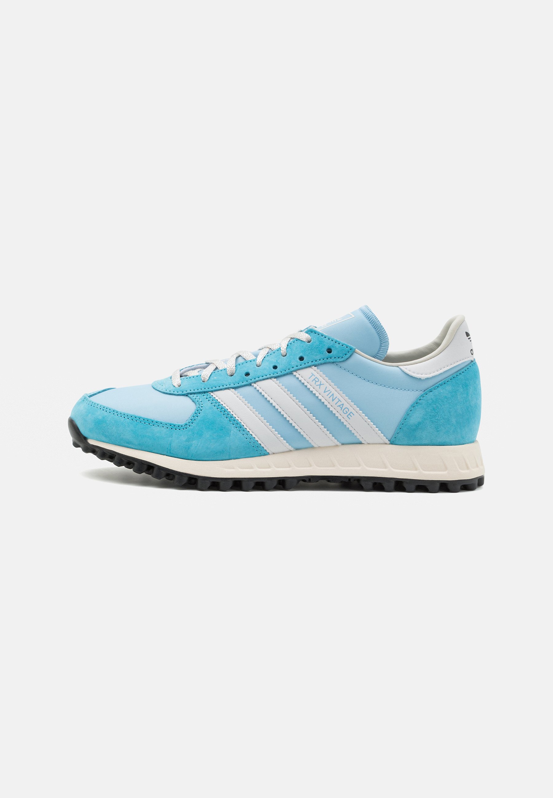 

Кроссовки женские Adidas Originals Trx Vintage Unisex голубые 39 1/3 EU, Голубой, Trx Vintage Unisex