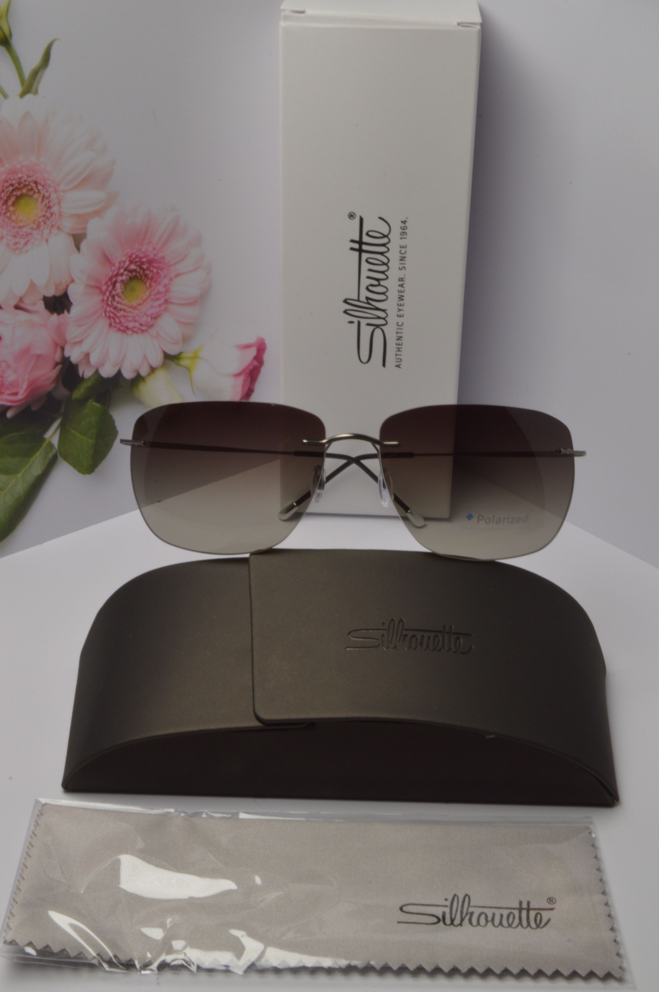 

Солнцезащитные очки унисекс Silhouette OL-SZO-Silhouette-8698-40-6560 коричневые, OL-SZO-Silhouette-8698-40-6560