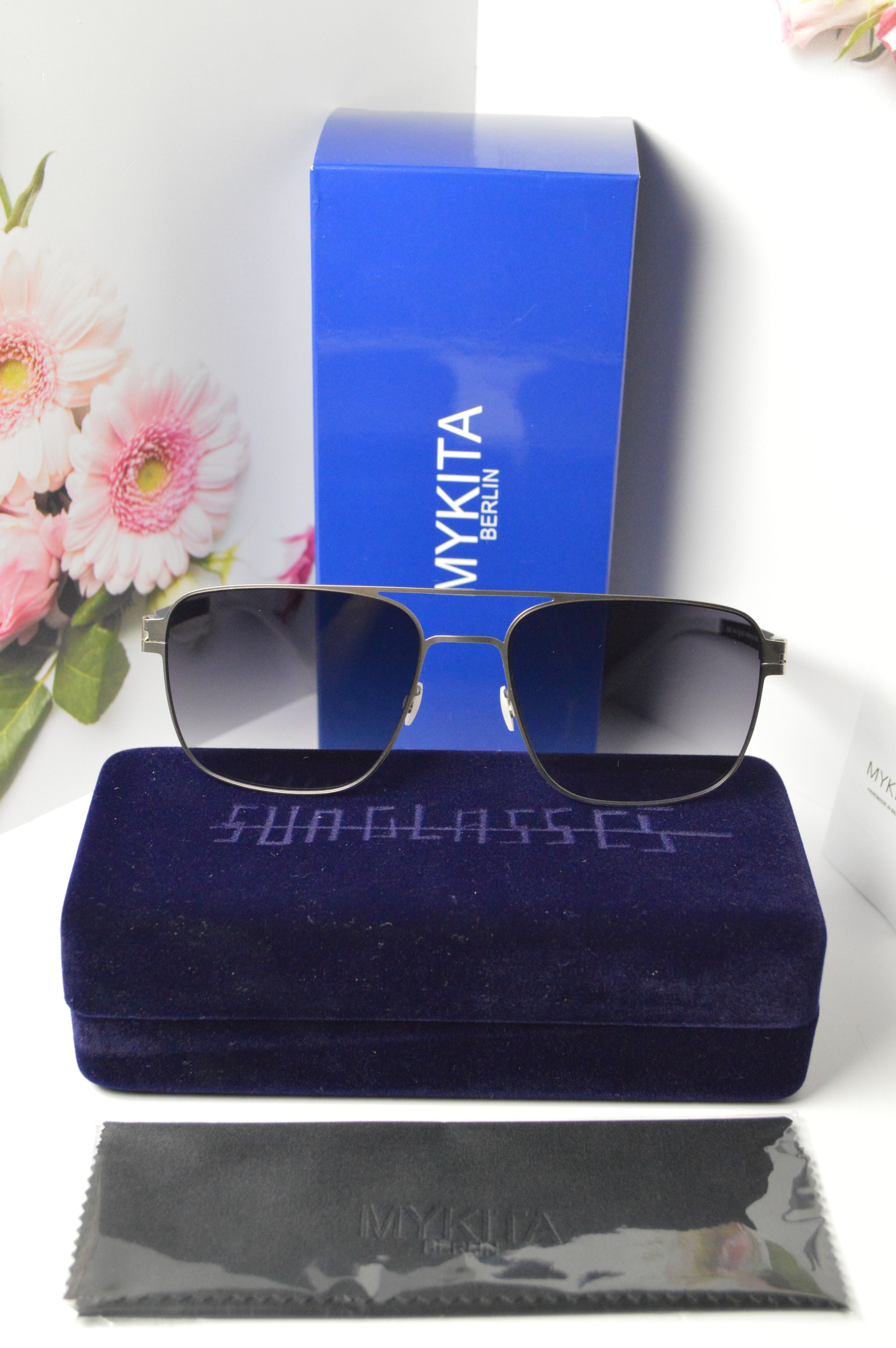 Солнцезащитные очки унисекс MYKITA OL-OM-MYKITA-DON-COL-552 черные 8500₽