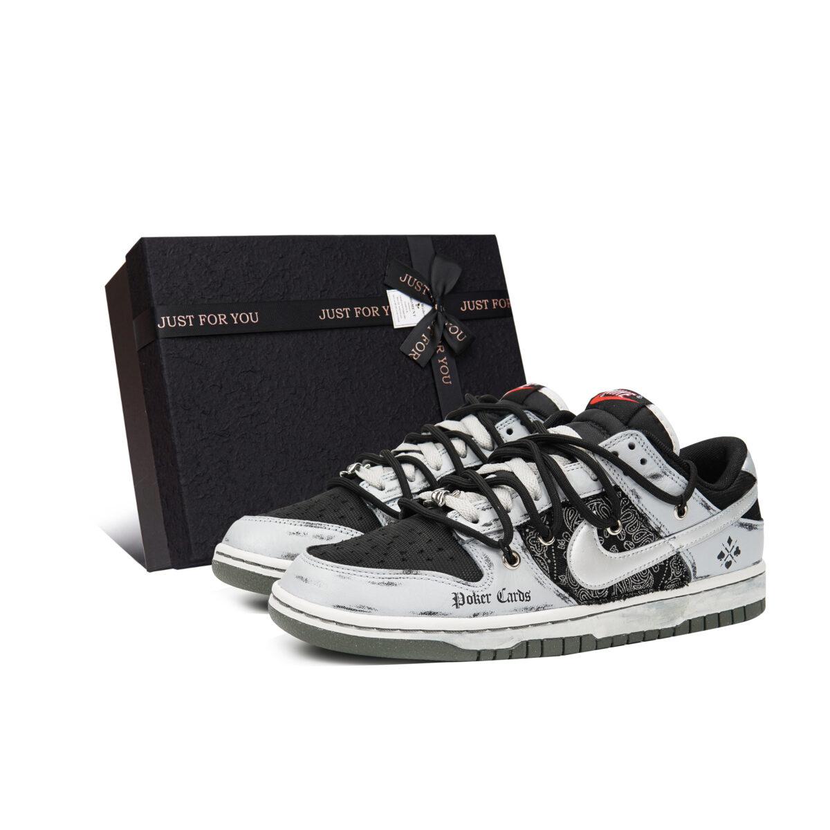 

Кеды унисекс Nike Dunk Low серые 40.5 EU, Серый, Dunk Low