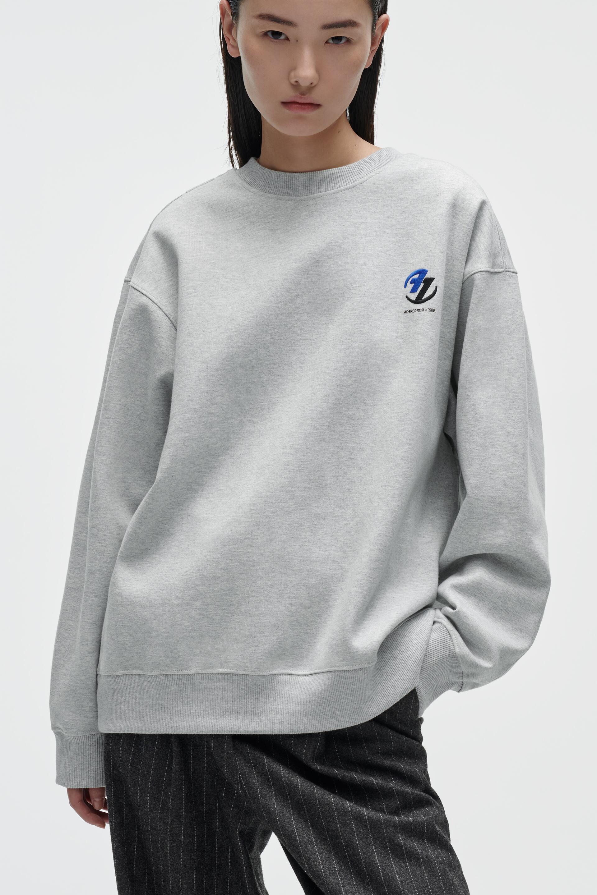 

Свитшот женский ZARA 00264002 серый L/XL (доставка из-за рубежа), 00264002