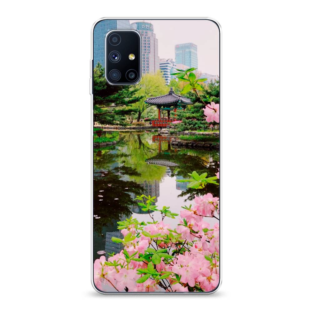 

Чехол на Samsung Galaxy M51 "Сакура возле озера", Зеленый;розовый;голубой, 2101550-2