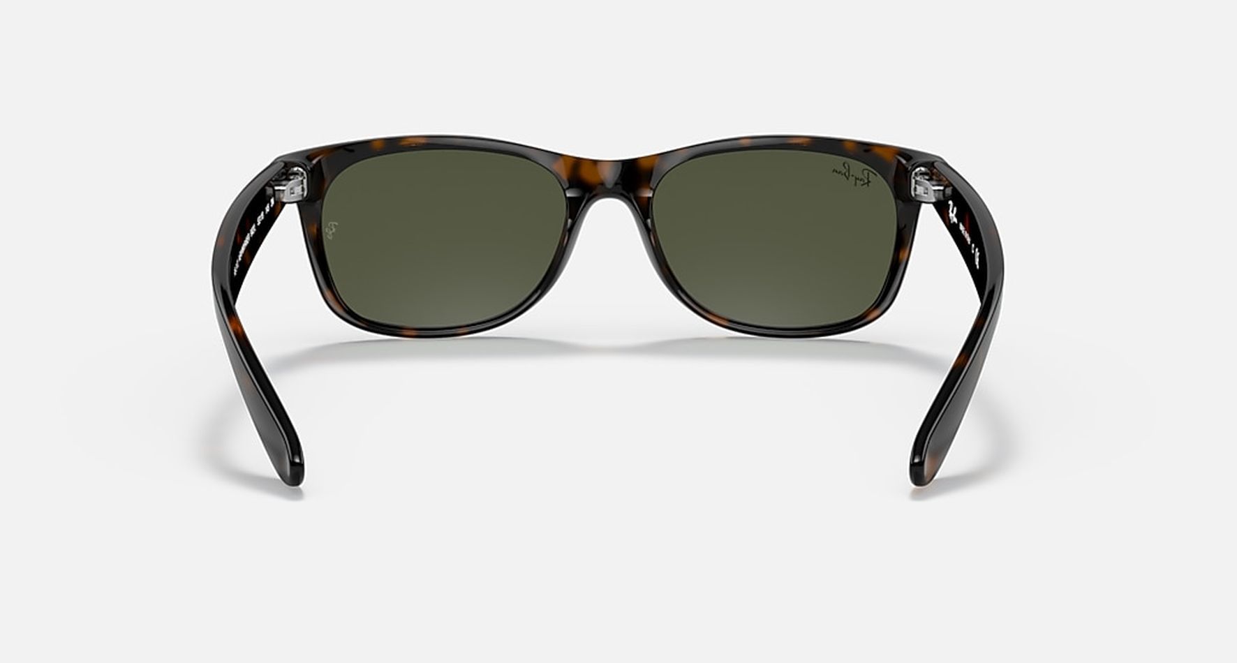 

Солнцезащитные очки унисекс Ray-Ban RB2132 коричневые, RB2132