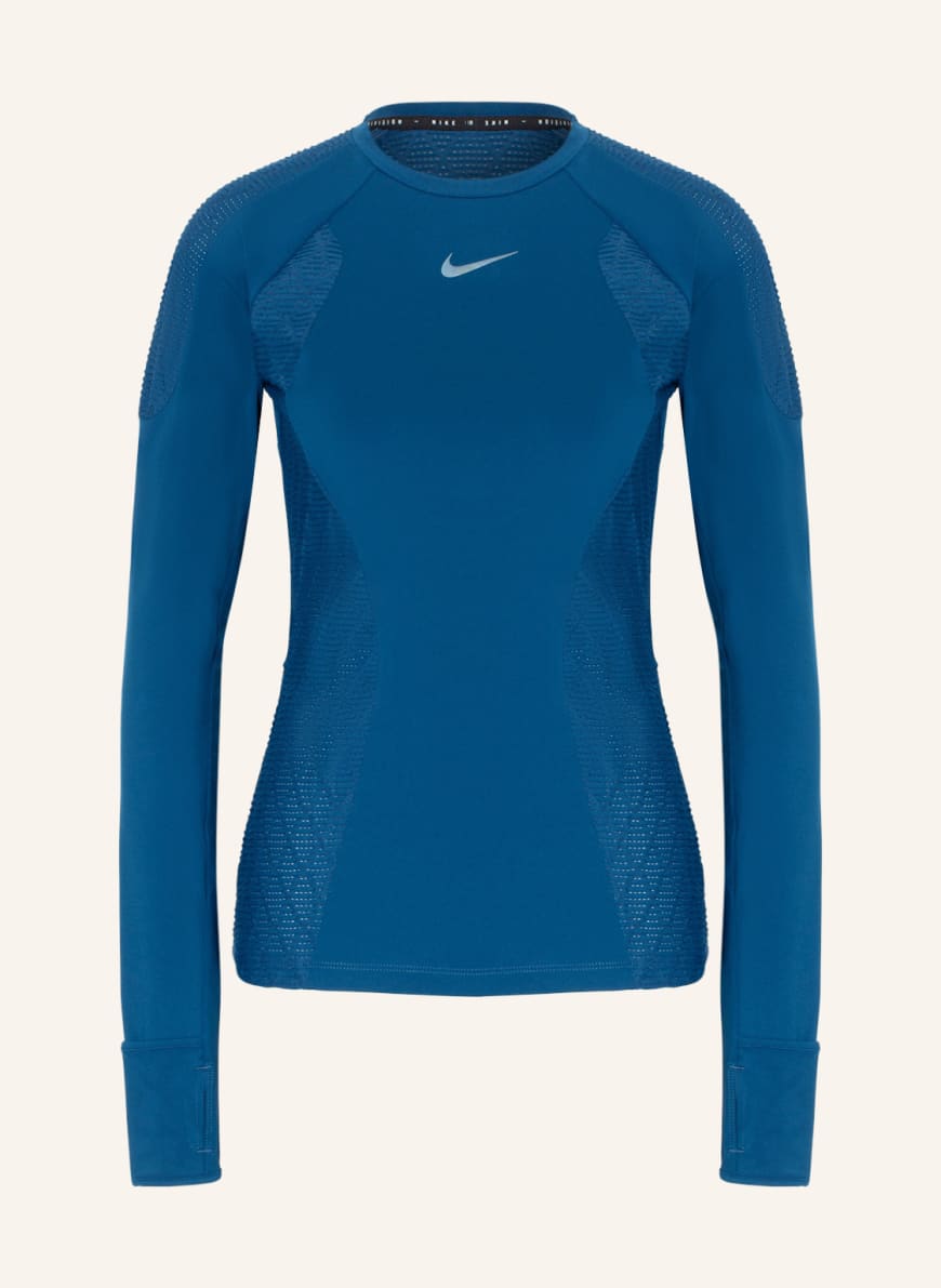 

Лонгслив женский Nike 1001362408 голубой L (доставка из-за рубежа), 1001362408
