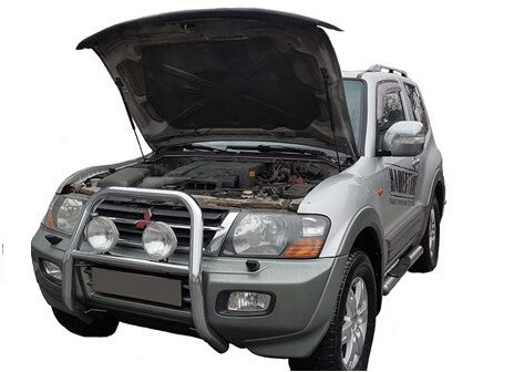 Амортизатор (упор) капота на Mitsubishi Pajero 02-04(с 2000 по 2007 г.в.)Autoinnovation