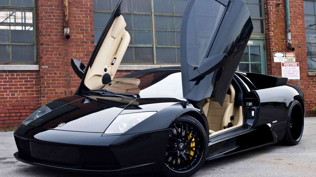 Дверцами открывается машина. Lamborghini Murcielago lp640 Black. Ламборгин и Мерселаго черная. Ламборджини Murcielago черная. Lamborghini Murcielago lp640 Matt Black.