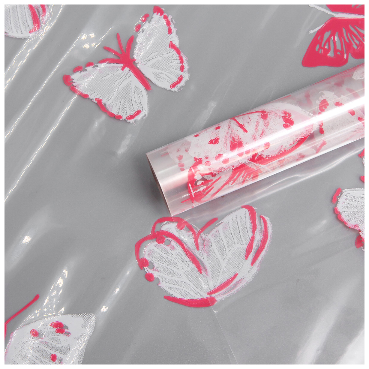 Пленка прозрачная двухцветная с рисунком Бабочки бело-розовая 70см*9,14м +/- 5%