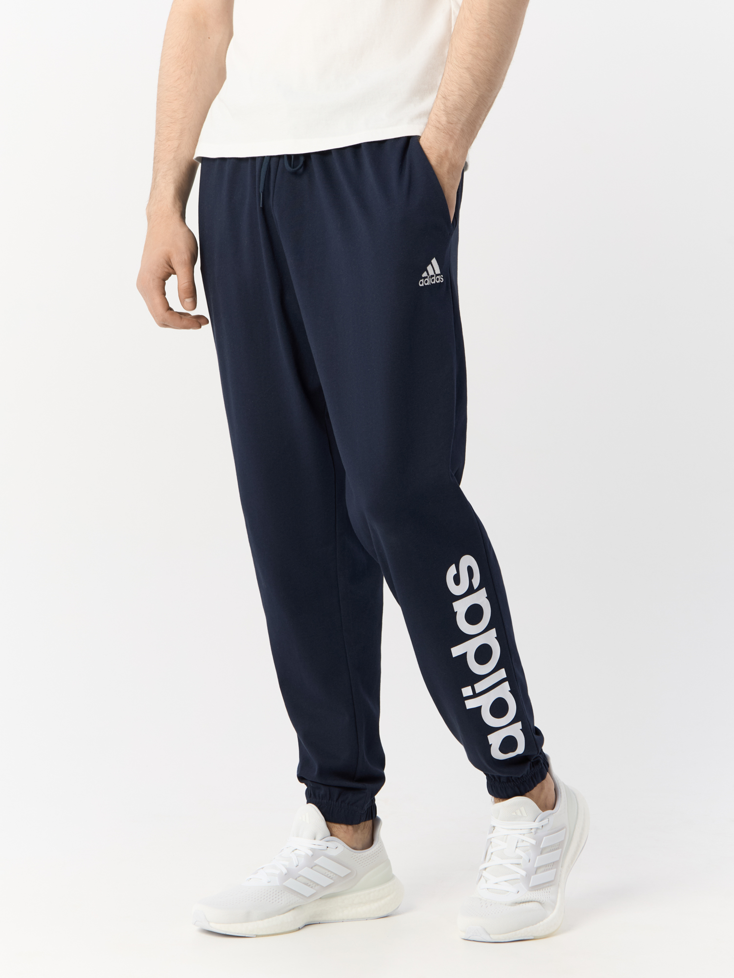 

Спортивные брюки мужские Adidas Sportswear Essentials Single Jersey Tapered синие XS, Синий, Essentials Single Jersey Tapered Elasticized Cuff Logo