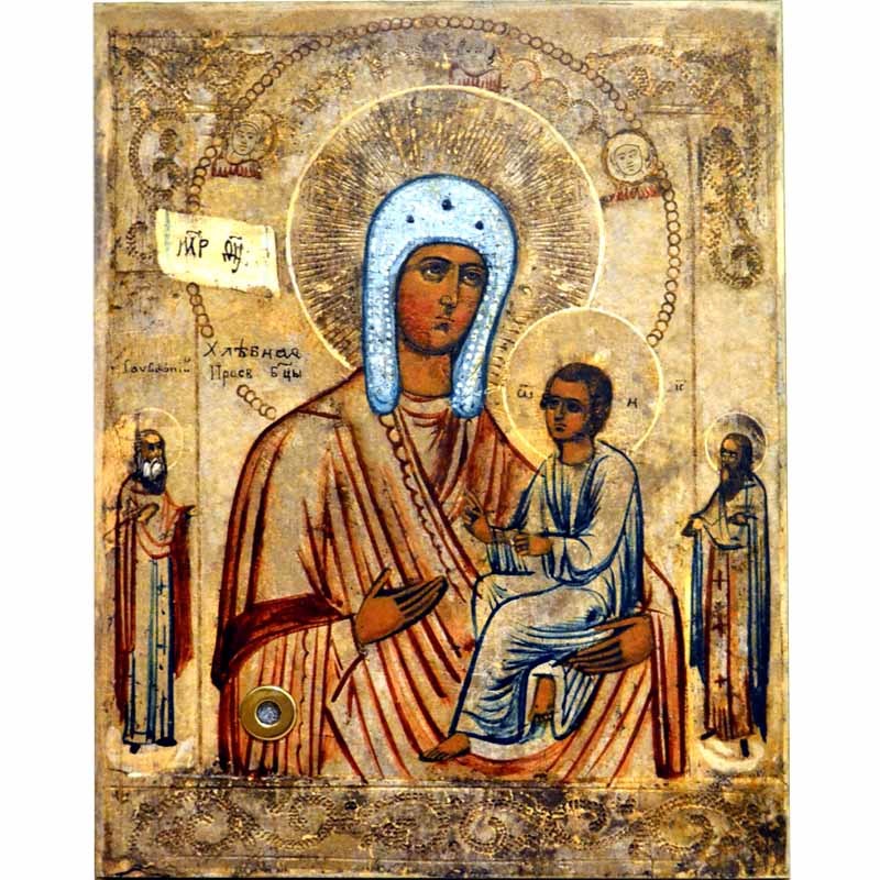 

Хлебная (Запечная) икона Божьей Матери на дереве с мощевиком.