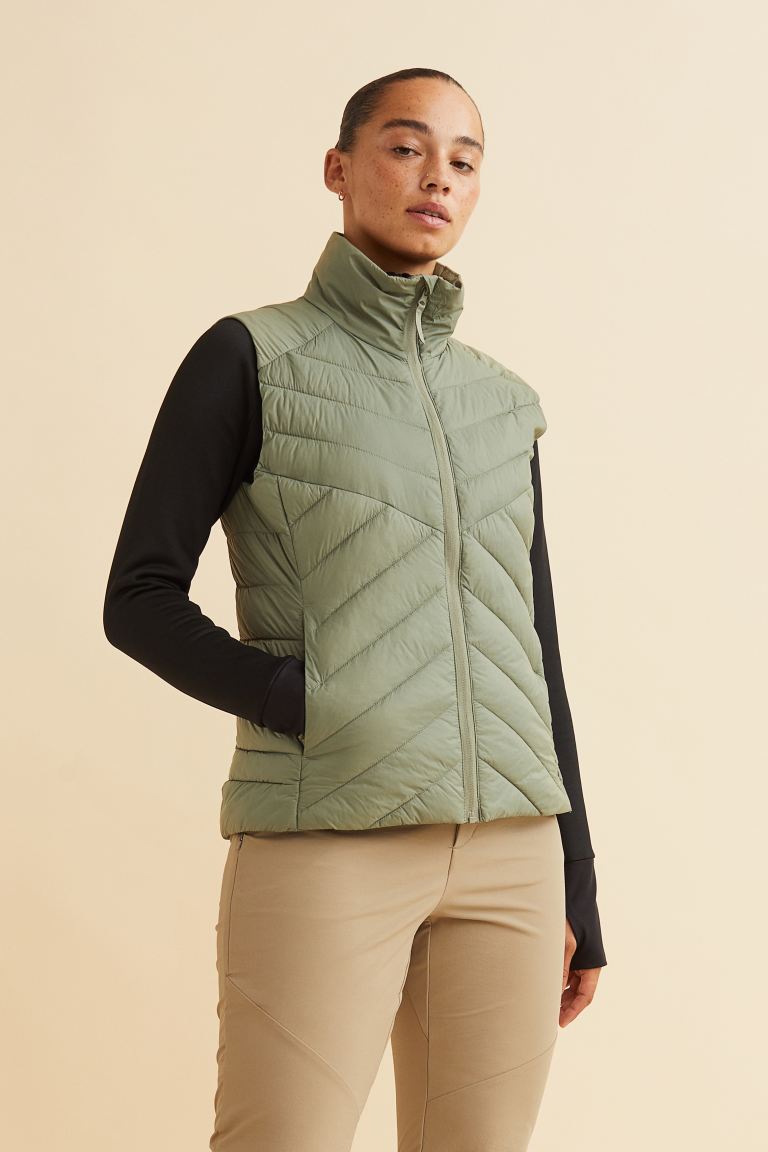 

Утепленный жилет женский H&M 1067048005 хаки XS (доставка из-за рубежа), 1067048005