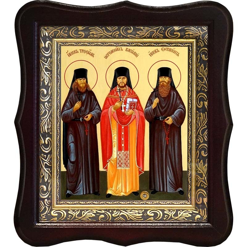 

Икона Оптинских Новомучеников на холсте с мощевиком.