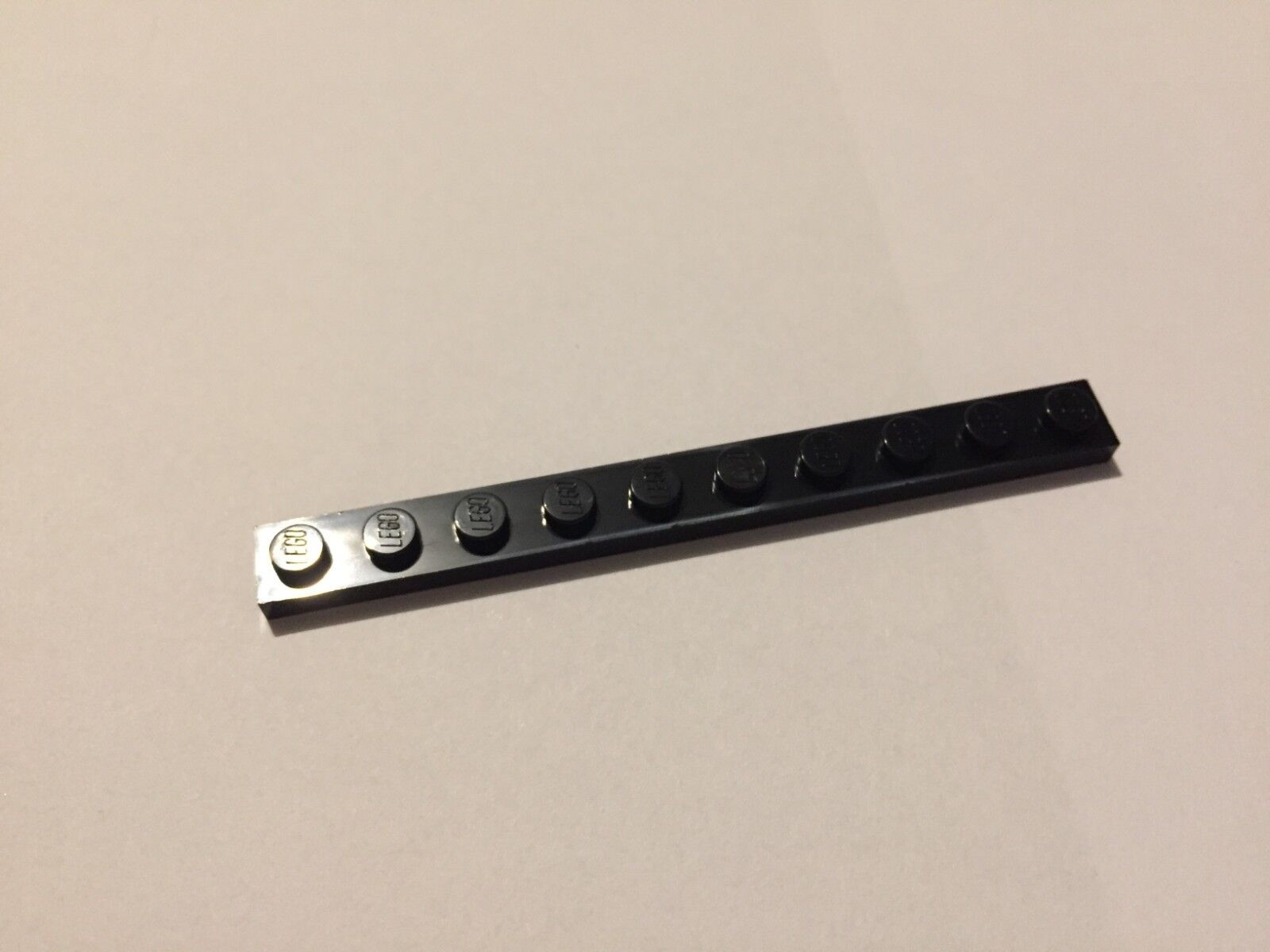 

Деталь LEGO 447726 Плитка 1X10 черная 50 шт