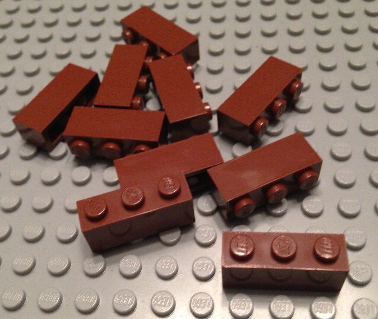 

Деталь LEGO 4211220 Кирпичик 1X3 коричневый 50 шт