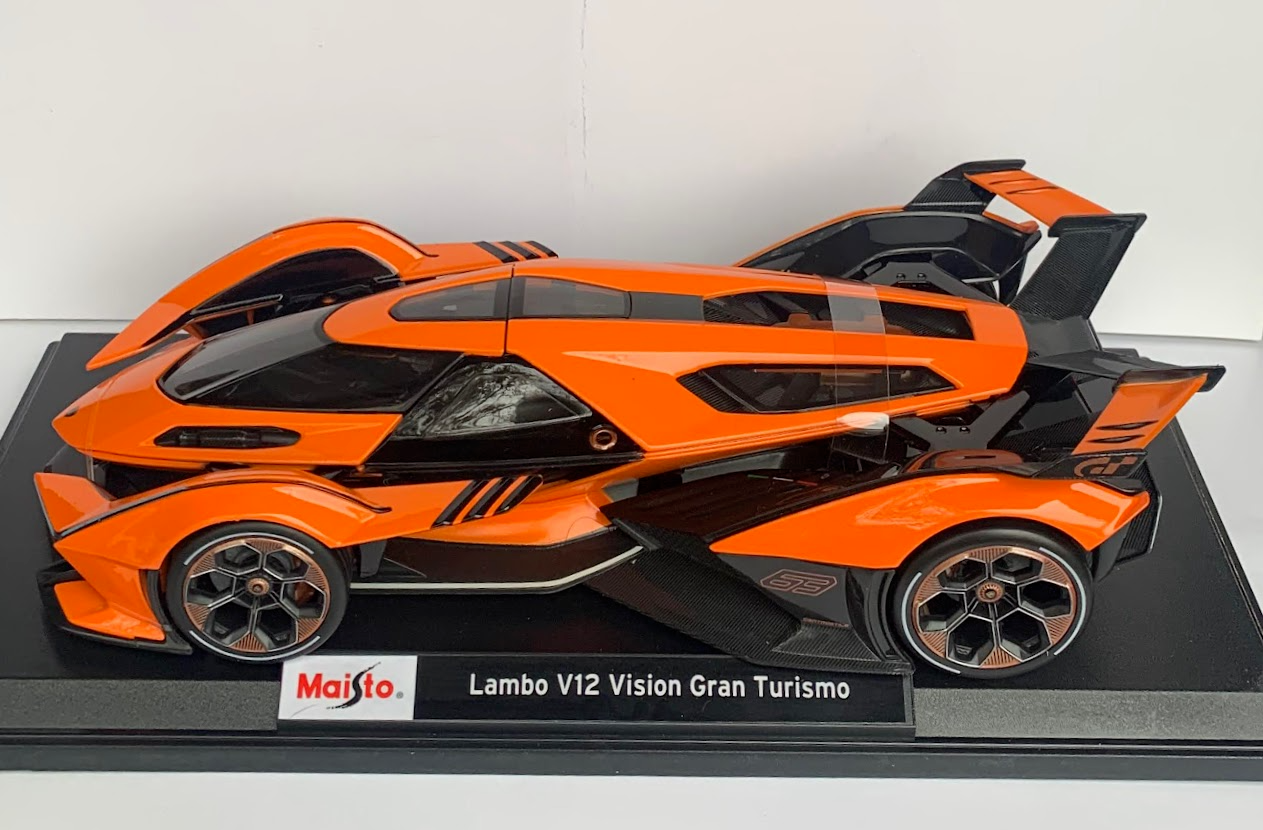 Машинка Maisto Lambo V12 Vision Gran Turismo 1:18 оранжевый 31454 машинка maisto lamborghini v12 vision gran turismo 1 18 36454