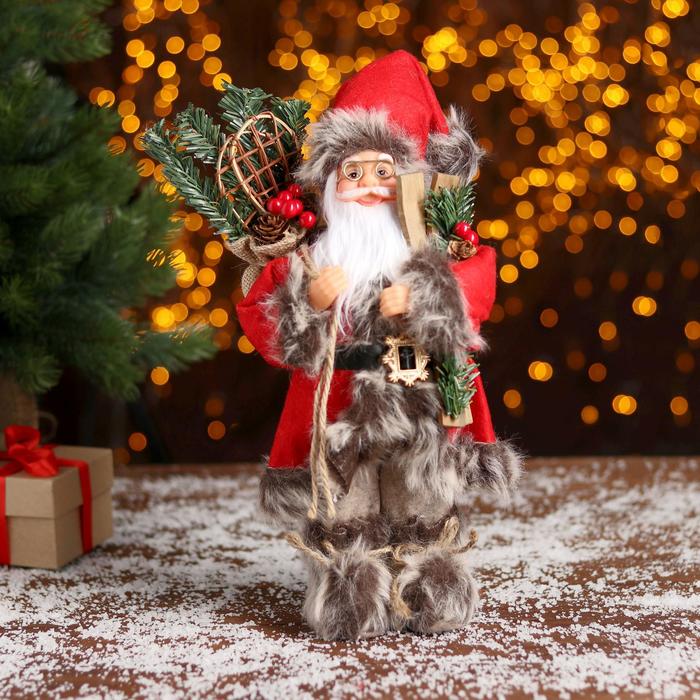 Новогодняя фигурка Зимнее волшебство Дед Мороз в красной шубке с лыжами 15x12x30 см