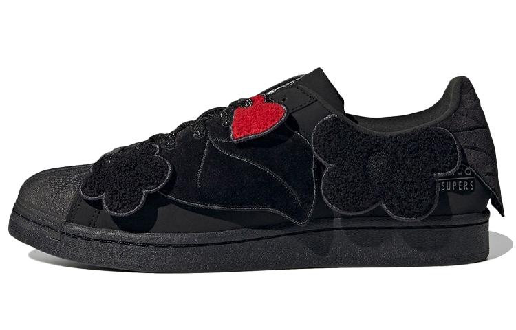 

Кеды унисекс Adidas melting sadness x adidas originals Superstar BEE WITH YOU черные 42 EU, Черный, melting sadness x adidas originals Superstar BEE WITH YOU