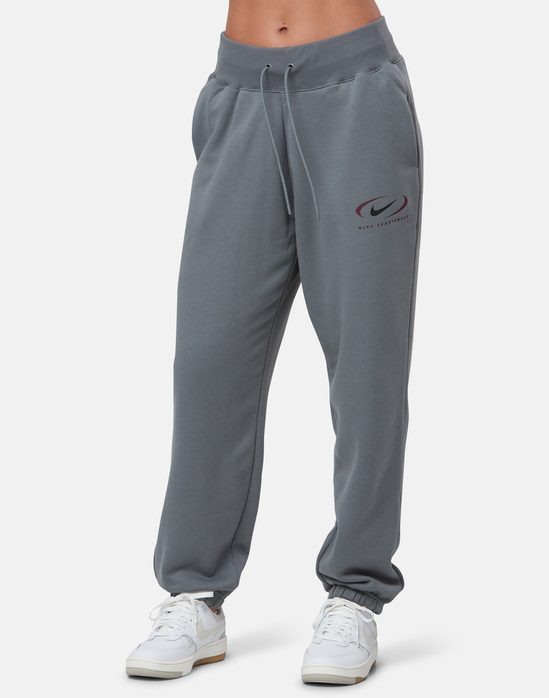 Спортивные брюки женские Nike W Phoenix Fleece Oversized High-Waisted Trousers серые M 10399₽