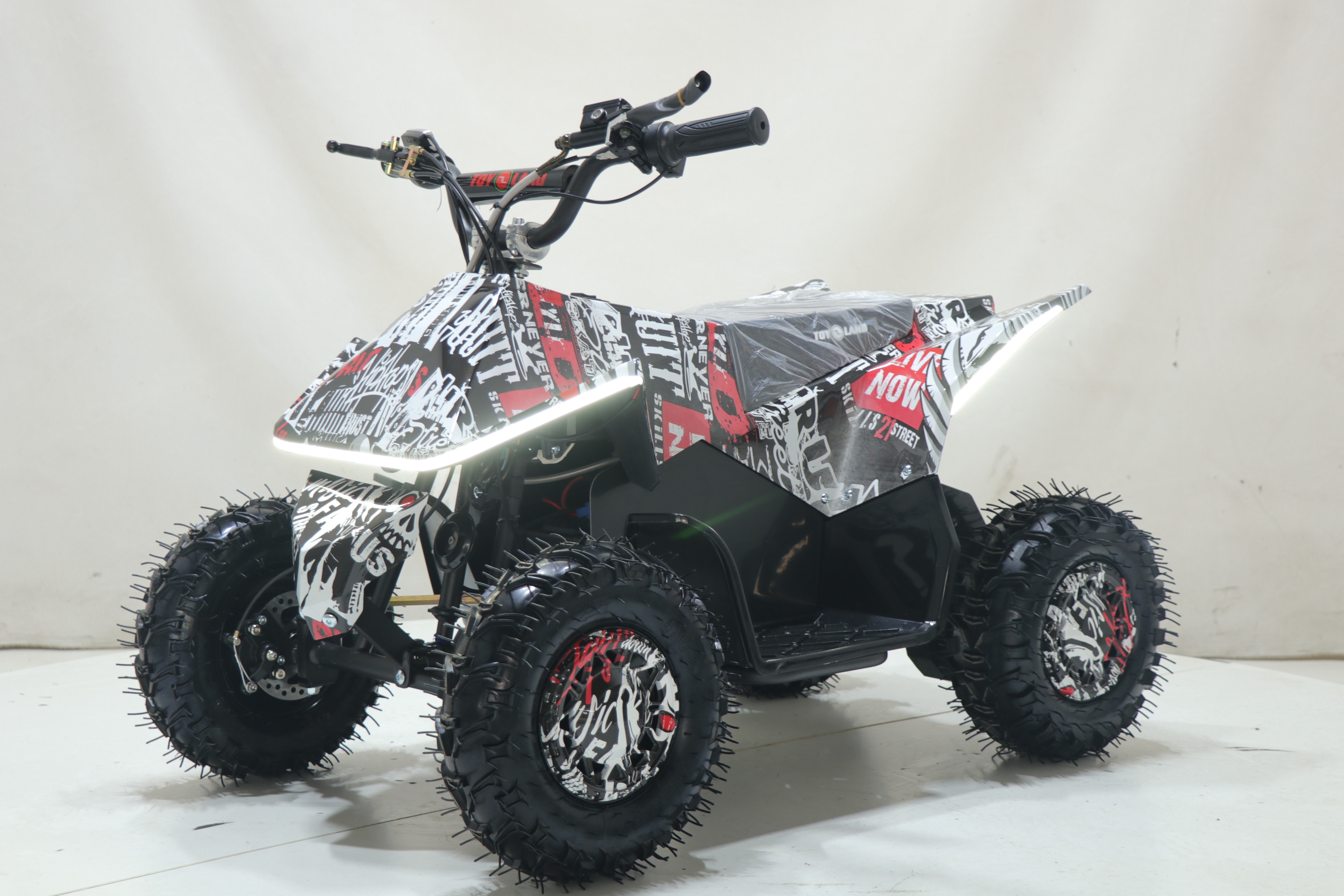 Квадроцикл Toyland Киберквад ATV-2E 36V1000W Мульти черный Scull8