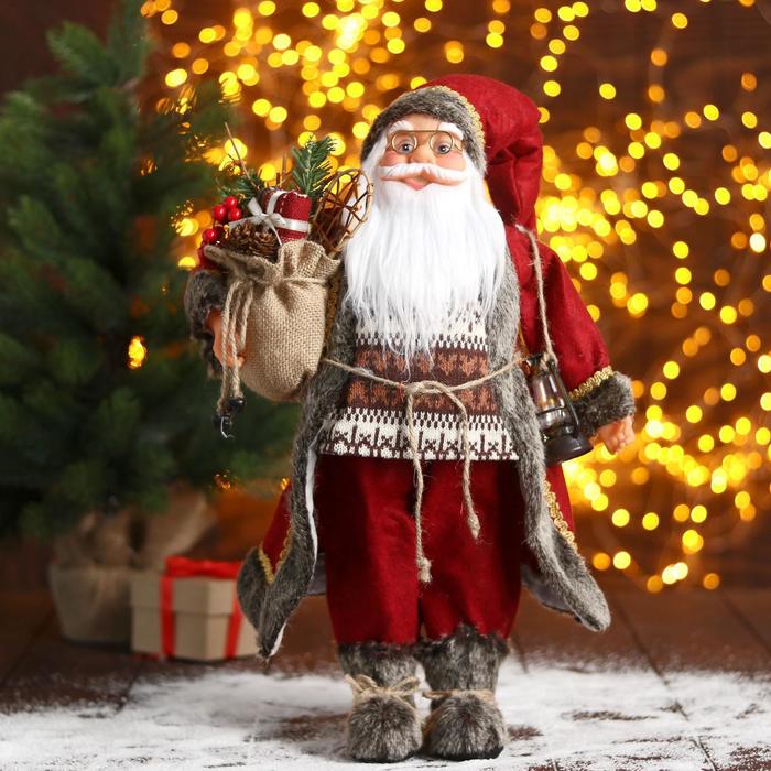 Новогодняя фигурка Зимнее волшебство Дед Мороз в красной шубке с фонариком 25x18x43 см