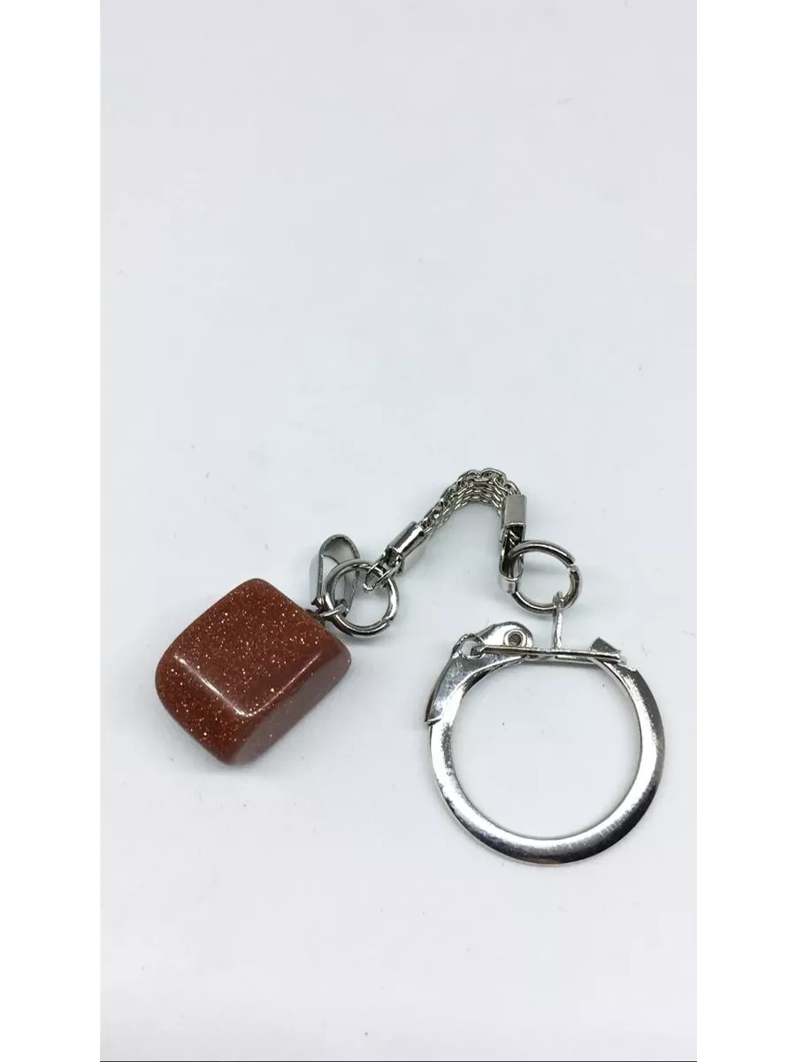 

Брелок унисекс NoBrand ст169, серебристый, Коричневый;серебристый, ст169