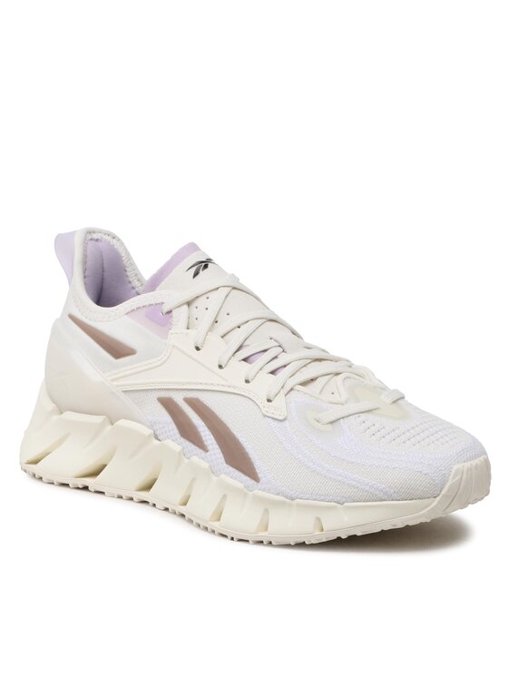 

Кроссовки женские Reebok Zig Kinetica 3 Shoes HR1319 бежевые 37.5 EU, Бежевый, Zig Kinetica 3 Shoes HR1319
