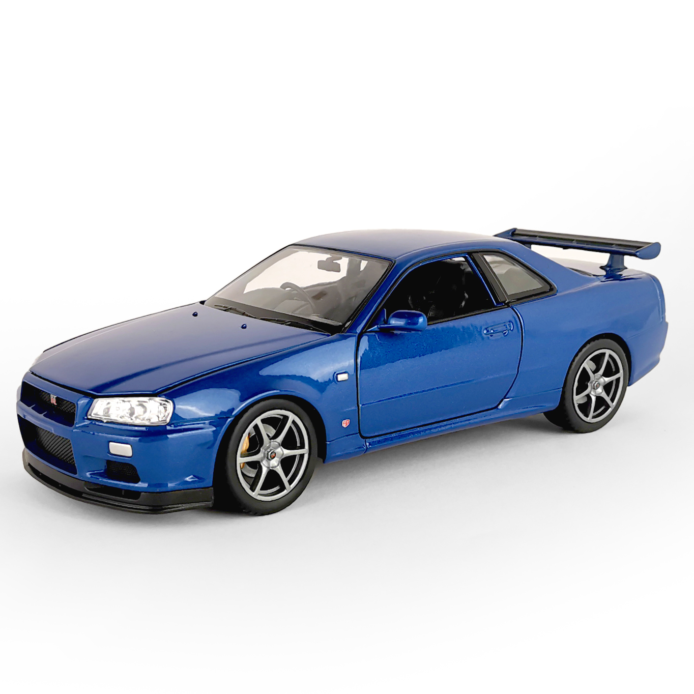 

Машинка WELLY 1:24 Nissan Skyline GT-R R34, синий, 24108W