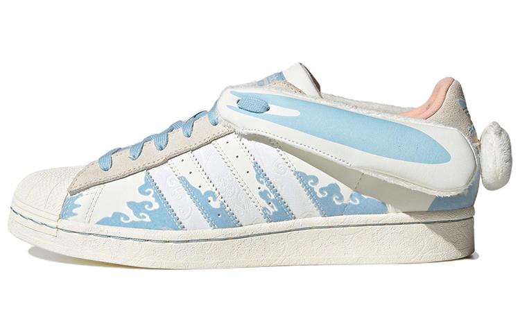 

Кеды унисекс Adidas melting sadness x adidas originals Superstar Papercut белые 43 EU, Белый, melting sadness x adidas originals Superstar Papercut