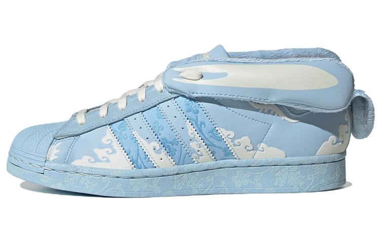 

Кеды унисекс Adidas melting sadness x adidas originals Superstar Papercut голубые 44 EU, Голубой, melting sadness x adidas originals Superstar Papercut