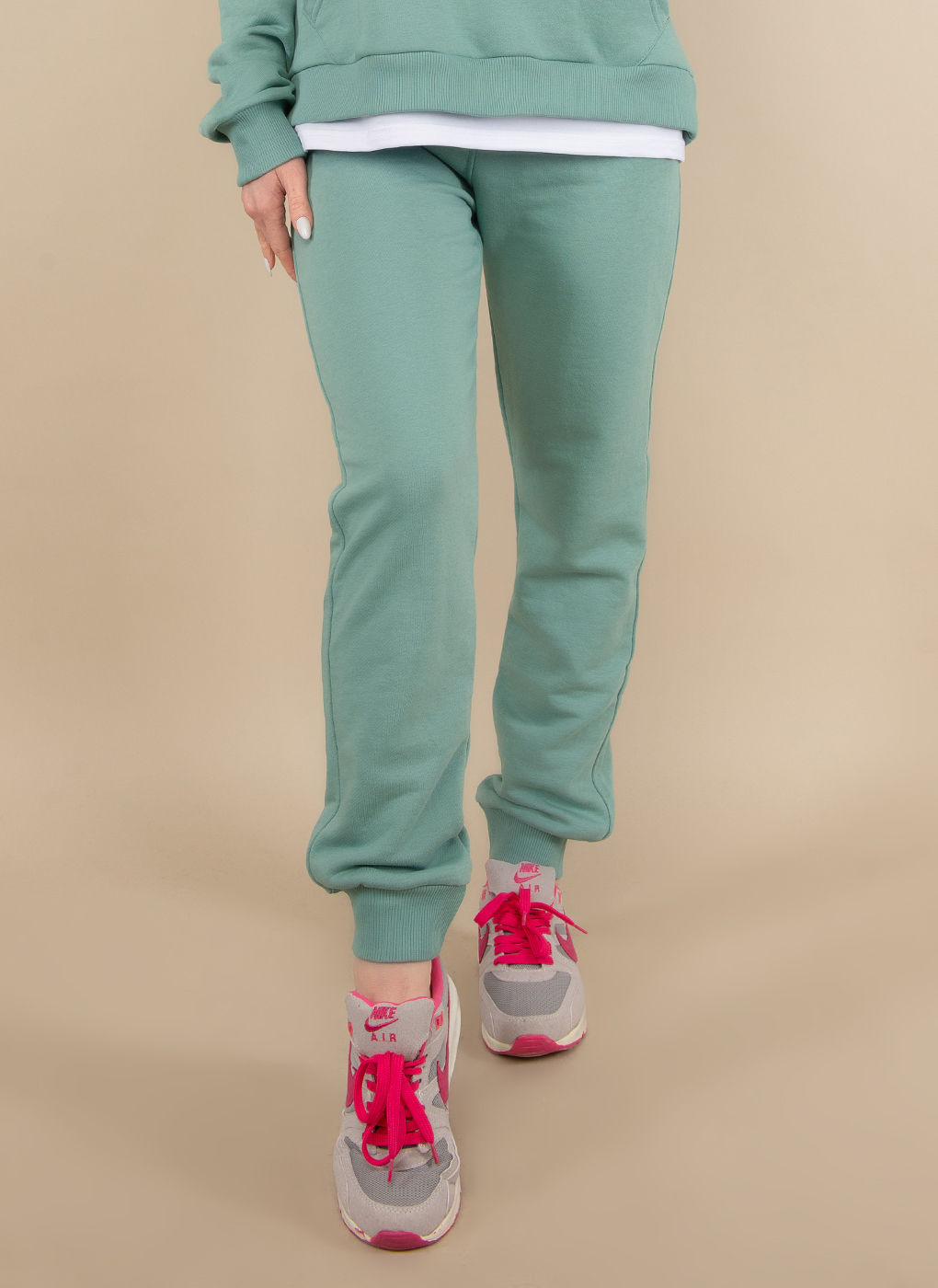 Спортивные брюки женские Каляев 50976 зеленые 40-42 RU