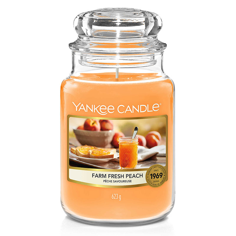 фото Свеча большая в стеклянной банке yankee candle свежий персик