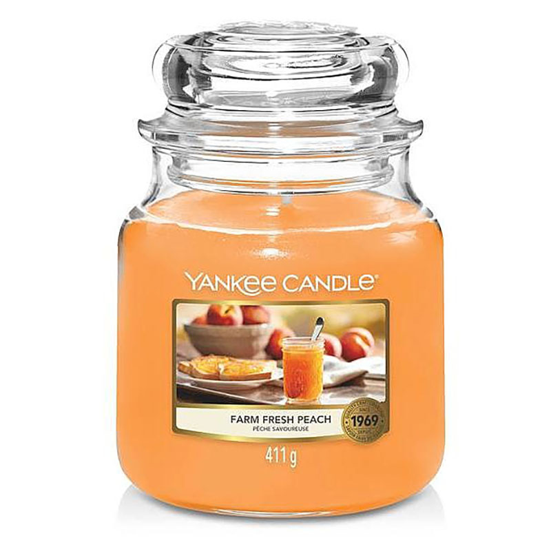 фото Свеча средняя в стеклянной банке yankee candle свежий персик