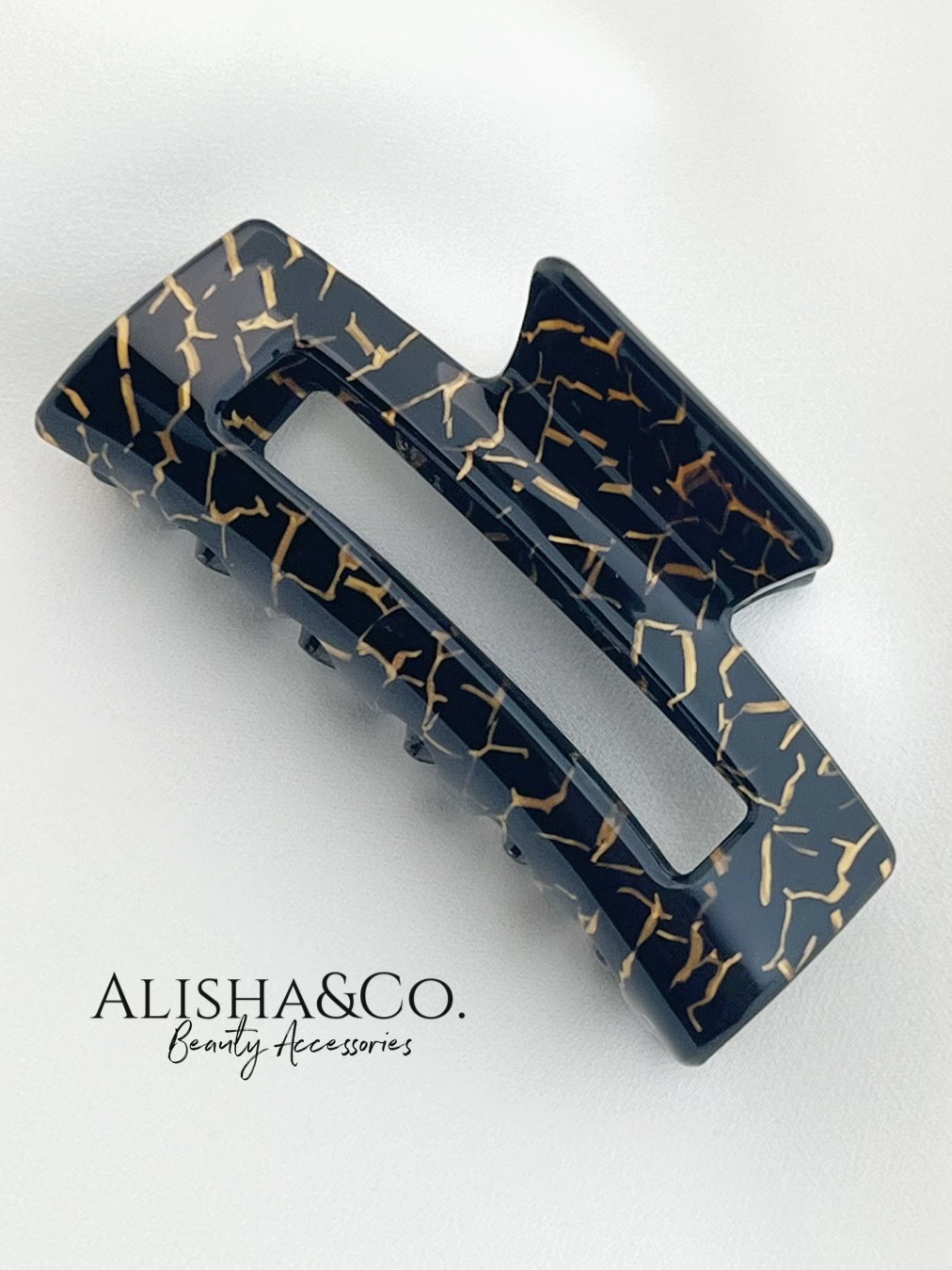 

Заколка-краб женская Alisha&Co. RECSNA1 черная с золотистым, Черный, RECSNA1