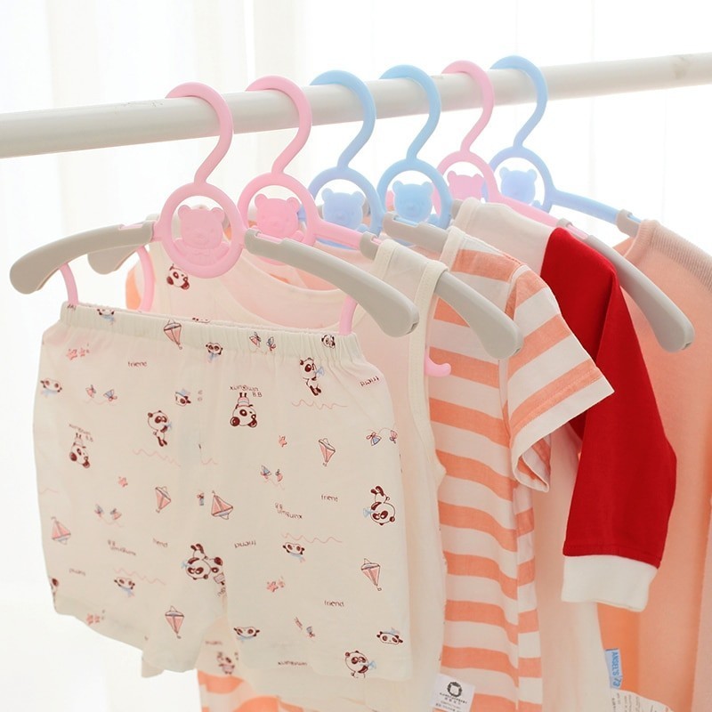 фото Вешалка-плечики для детской одежды с раздвижным механизмом, размер 30-34, розовый nobrand