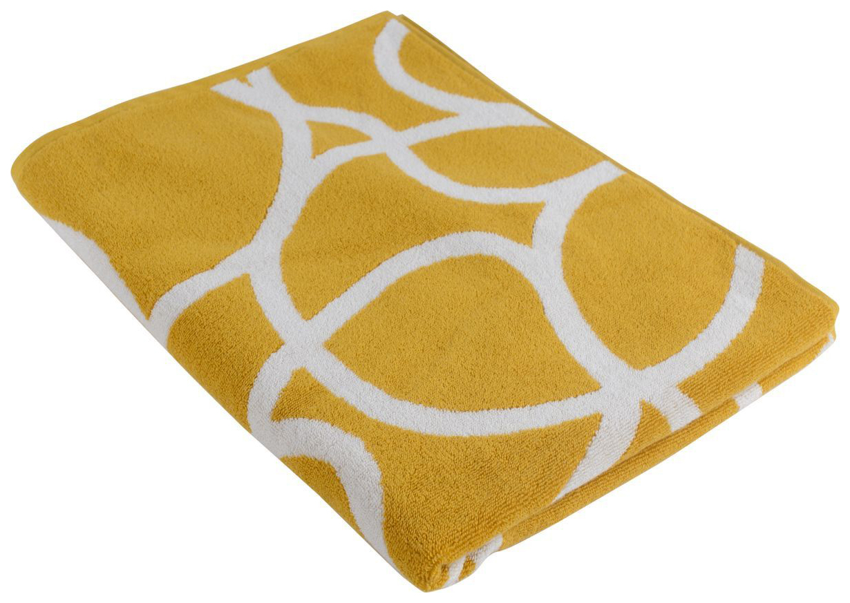 фото Жаккардовое полотенце с авторским дизайном gravity горчичного цвета cuts&pieces 70х140 tkano