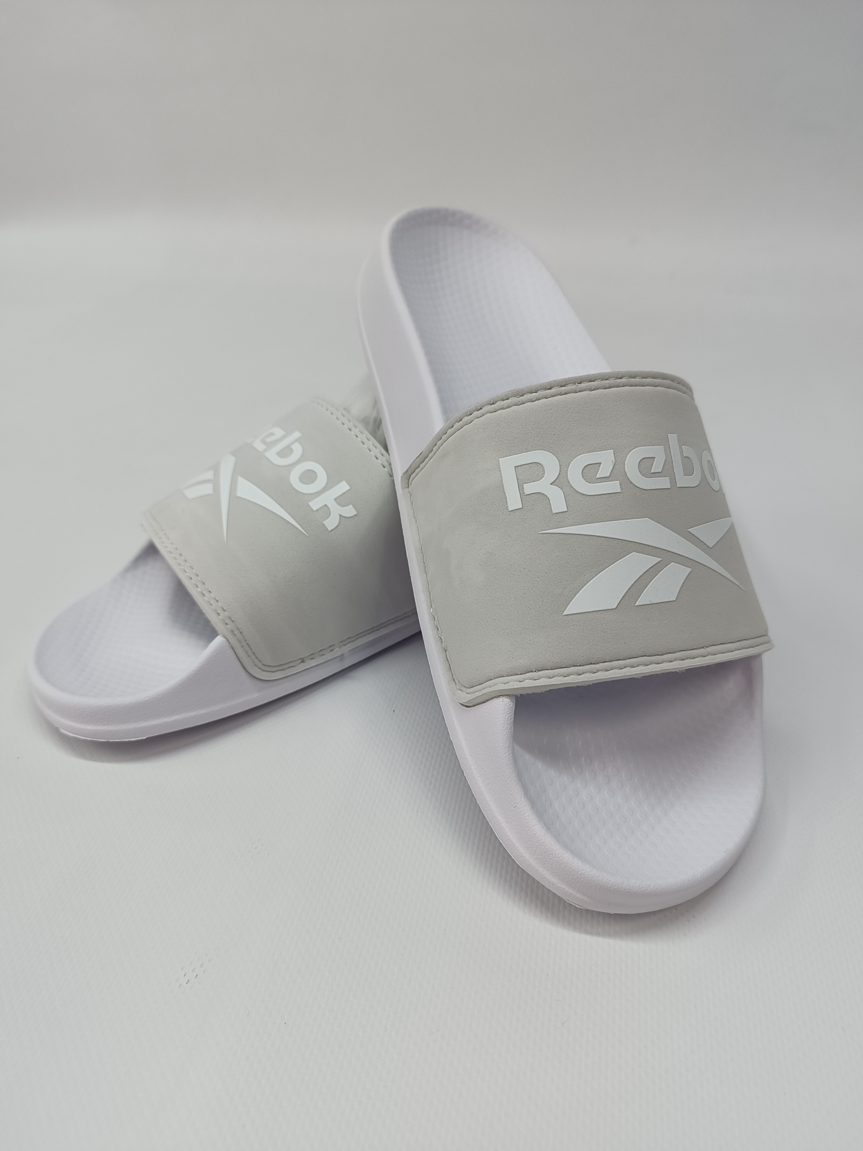 Сланцы унисекс Reebok RBK FULGERE SLIDE серые 6 US серый