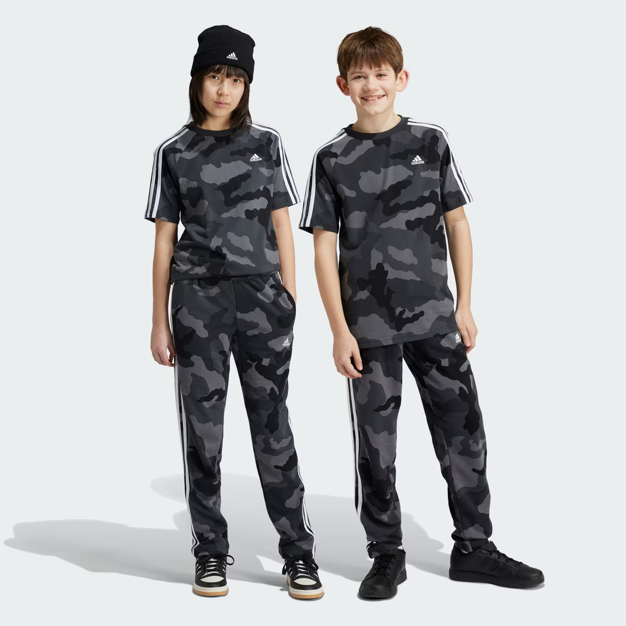 

Брюки детские Adidas Essentials Allover Print IV7303 серые 128, Серый, Essentials Allover Print