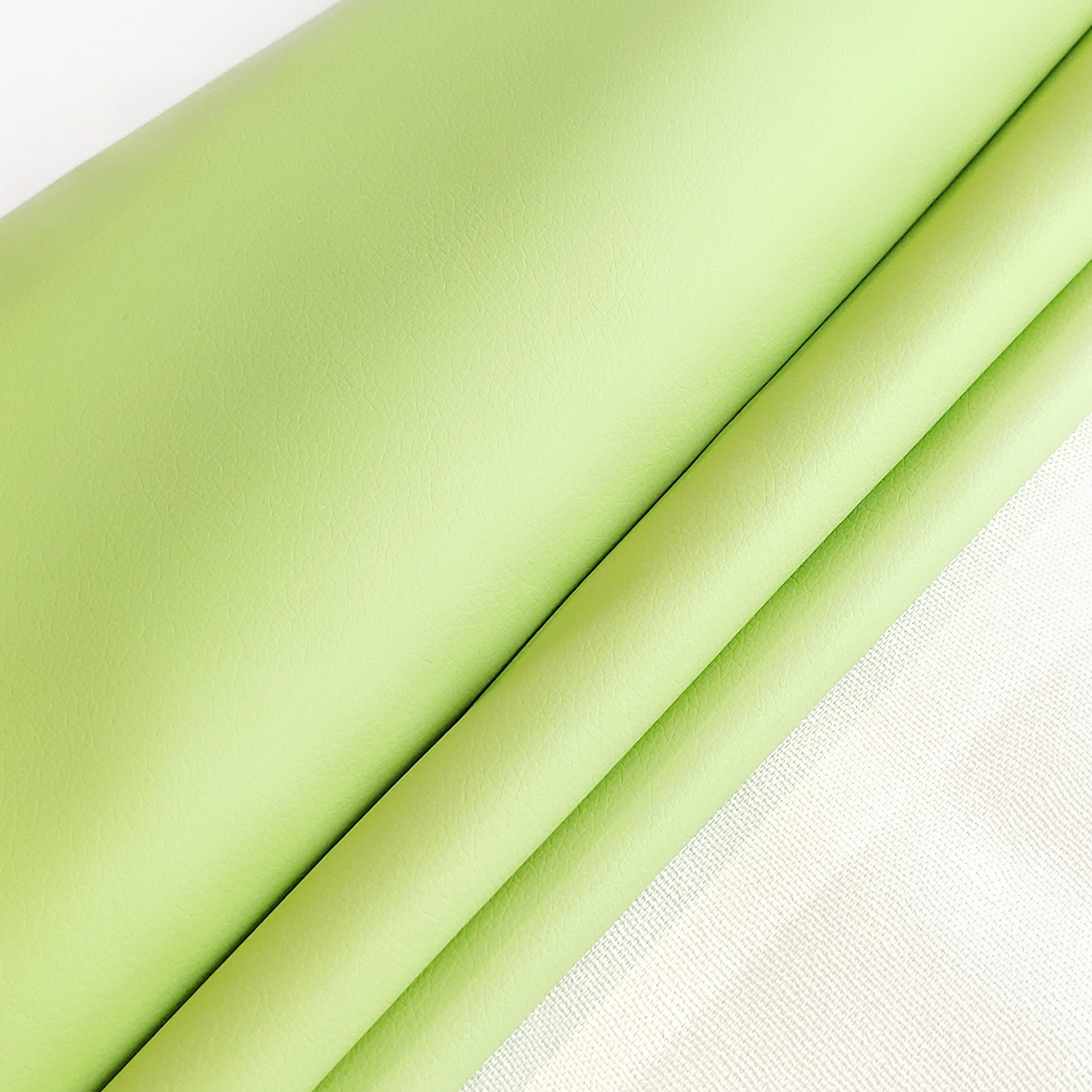 фото Экокожа для обивки мебели quartett зеленый 138*200см, кожзам для рукоделия