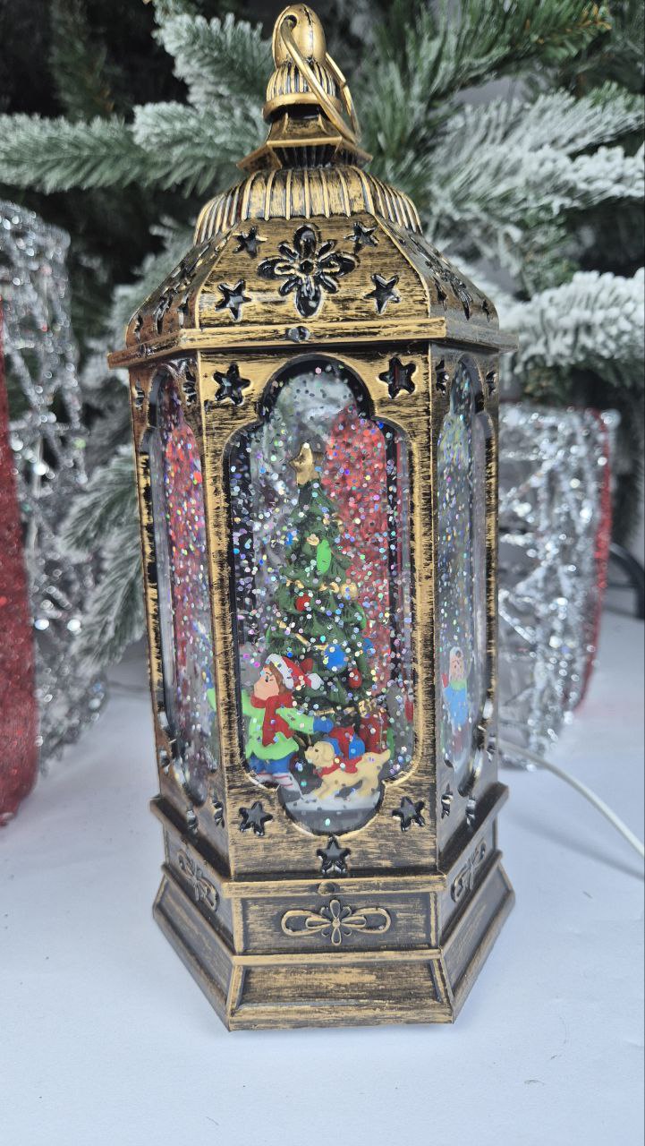 

Новогодний фонарь Merry Christmas Хоровод вокруг елки вращается 10.5х10.5х23.5см