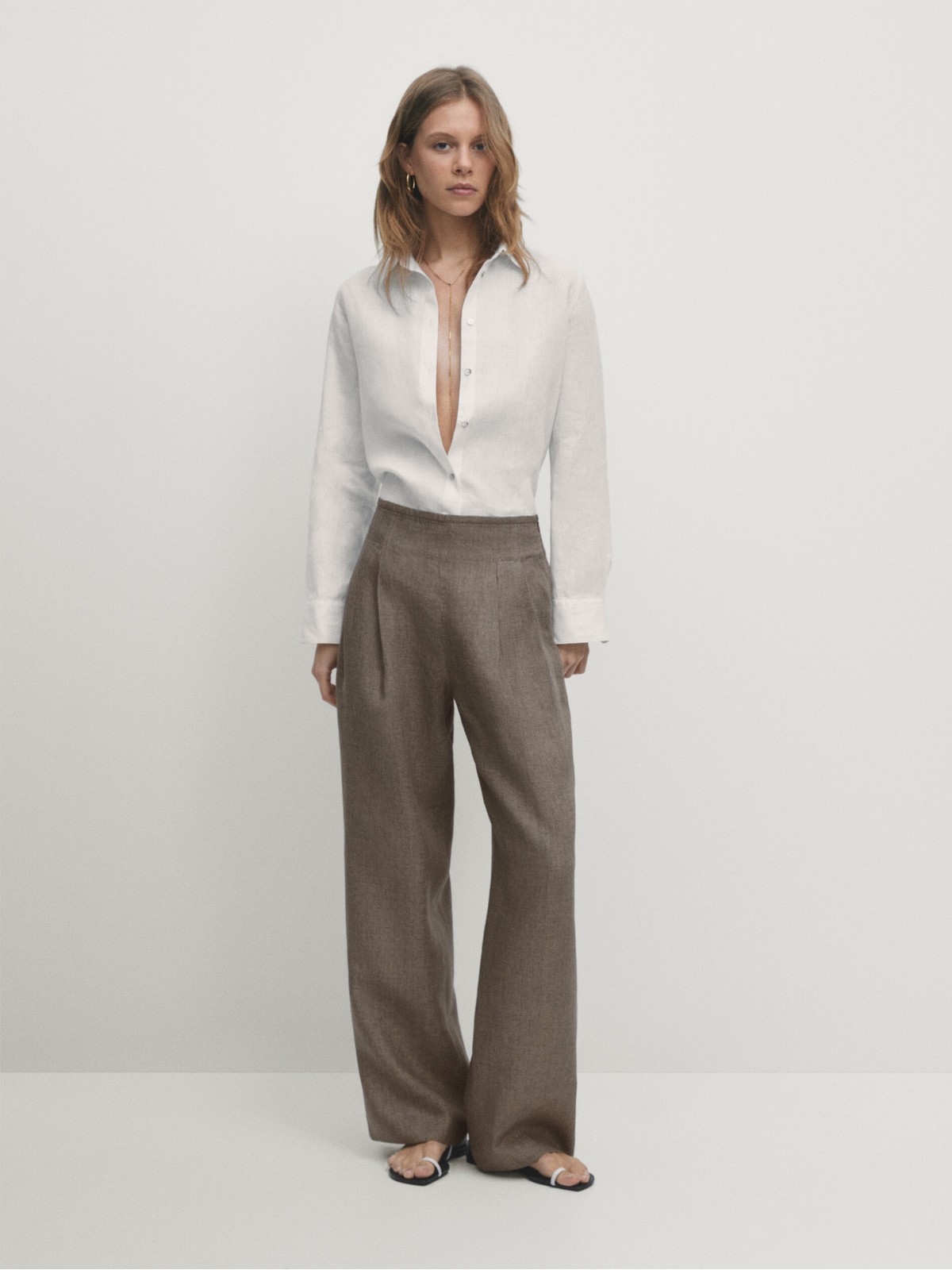 Брюки женские Massimo Dutti 5080771-I2024 бежевые 42 EU 16811₽