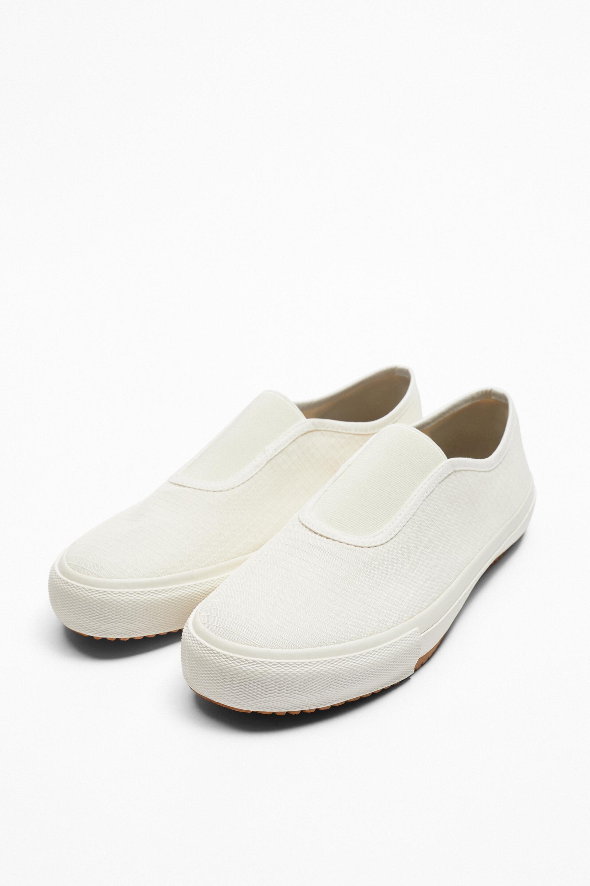

Слипоны мужские ZARA 184605 белые 42 RU (доставка из-за рубежа), 184605