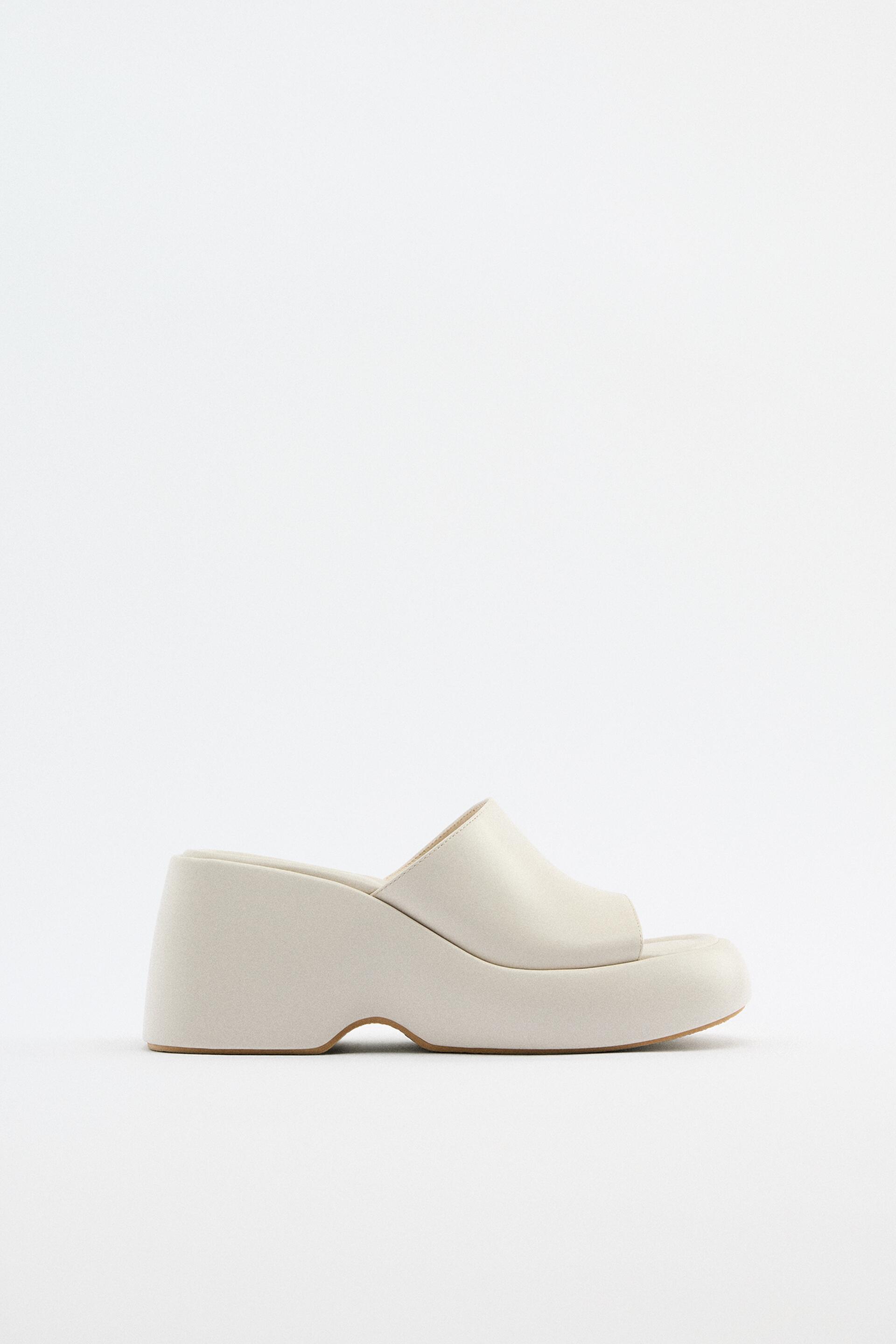 

Шлепанцы женские ZARA 177674 белые 41 RU (доставка из-за рубежа), 177674