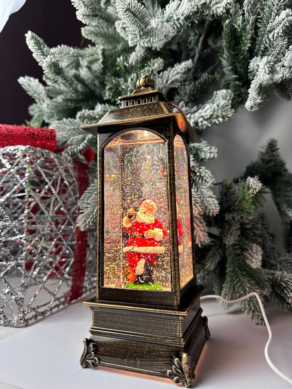 

Новогодний фонарь Merry Christmas Дед мороз с телефонной трубкой музыкальный 10х30 см