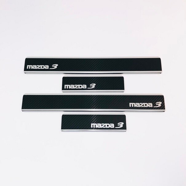 

Накладки INOX на пороги из нерж. стали + КАРБОН для Mazda 3 2013-н.в.