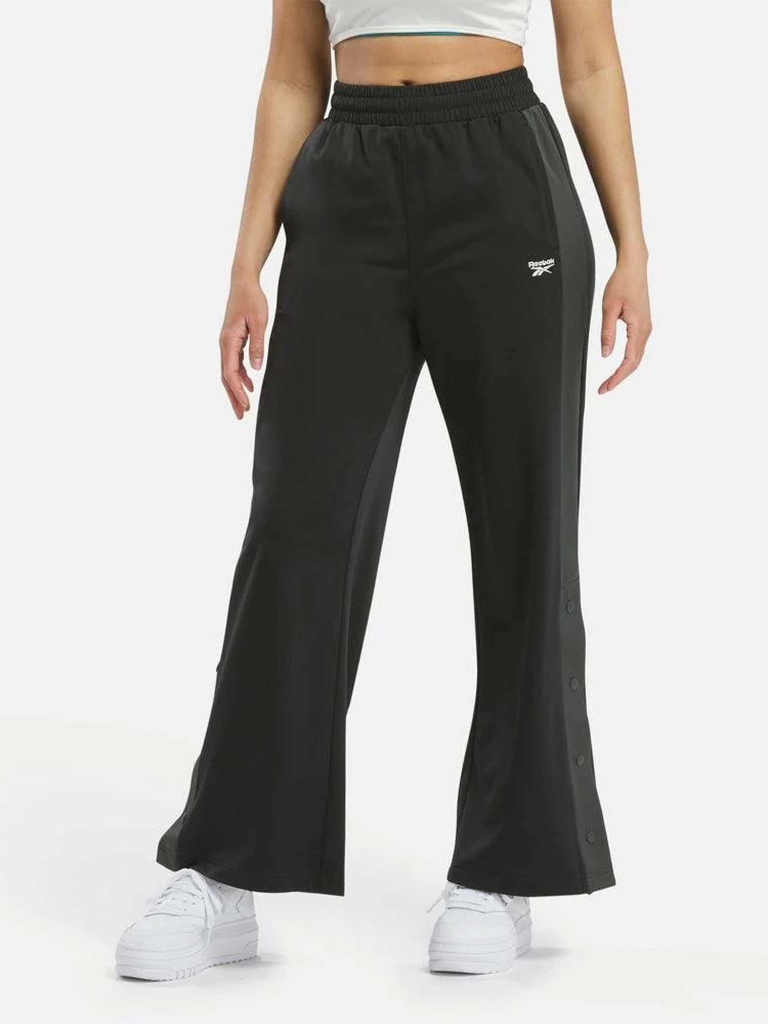 Спортивные брюки женские Reebok Team Pant 100208558 черные L